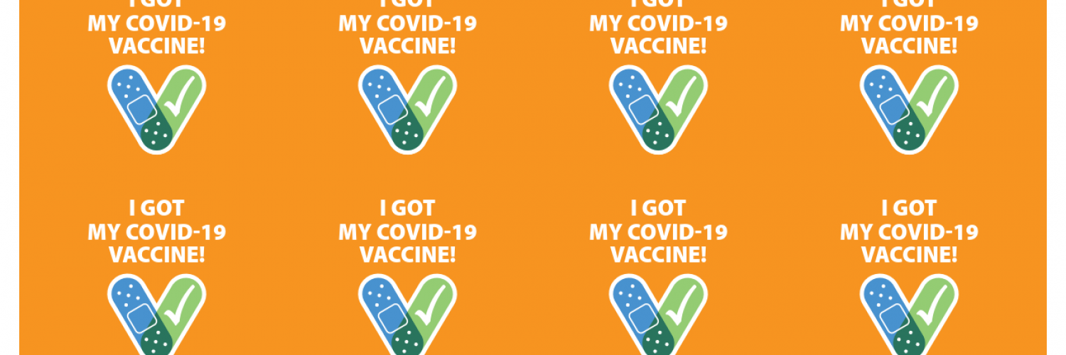 an orange sticker that reads "I got my COVID-19 Vaccine!" from the CDC